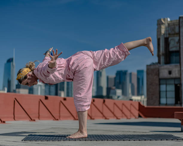 istock Rosie the Yogi does Rooftop Yoga 1387306166