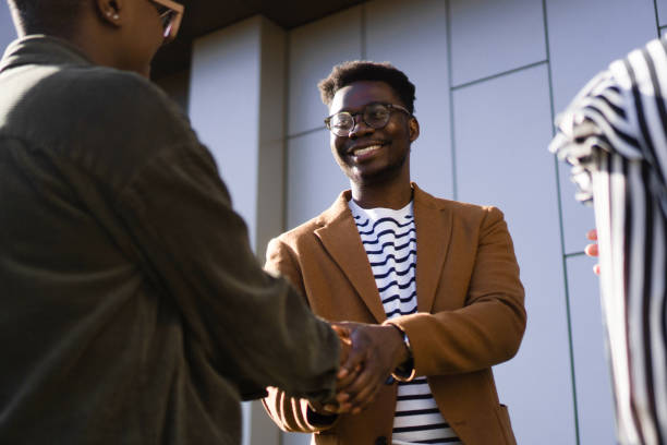 istock Casual Business Meeting Outside 1387309074