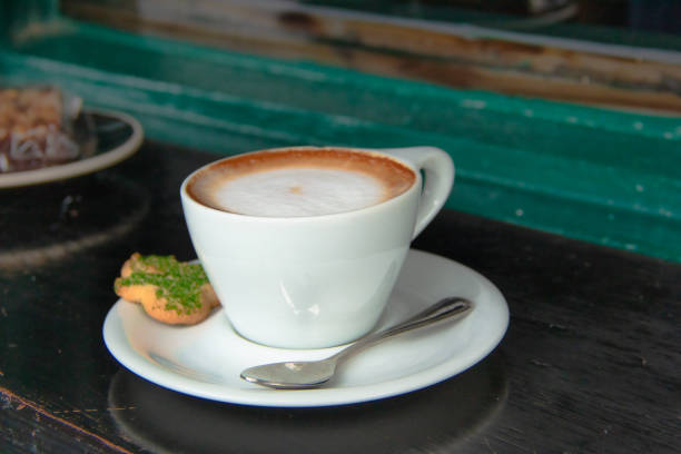 istock Coffee cup ready on a coffee shop place 1387310599