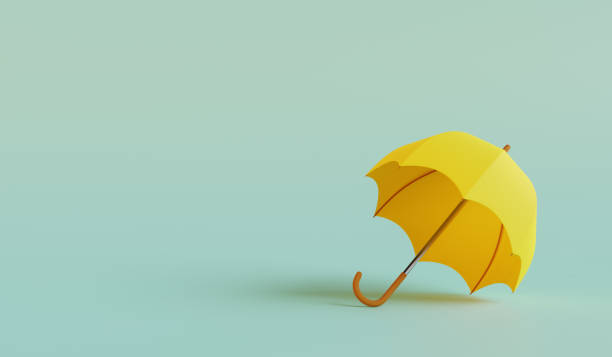 istock Classic elegant opened yellow umbrella on mint background. 3D render 1387311823