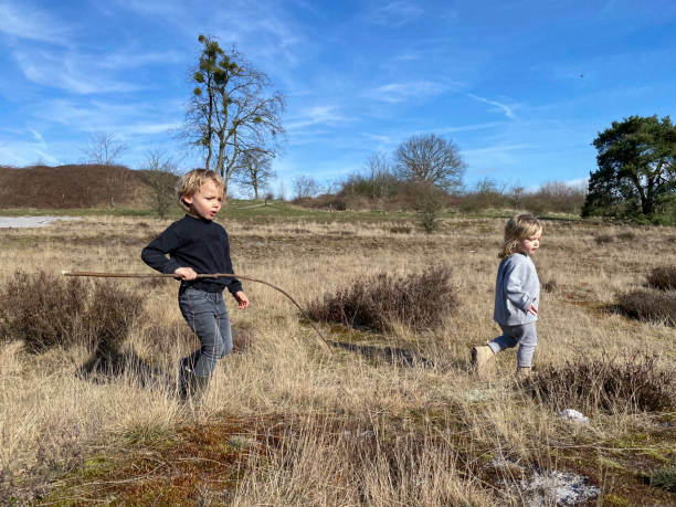 istock Toddlers playing in the moor 1387312285