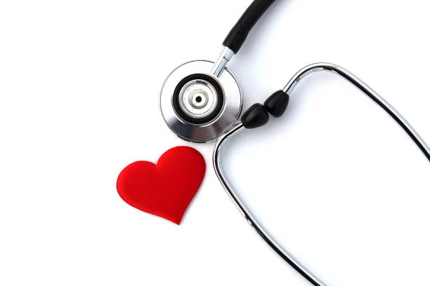 istock On a white background lies a red heart and a stethoscope. 1387315362