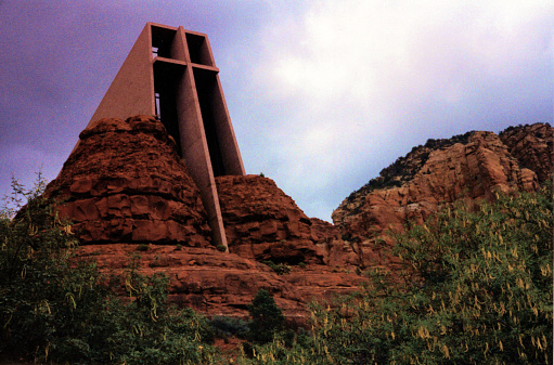 Among the Red Rocks of Sedona is nestled this Contrasting ultra-modern, nee futuristic chapel with it's geometric precision of straight lines integrated, yet dramatically juxtaposed against those red rocks.  It's this Chapel of the Holy Cross.