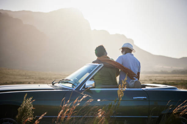 istock Mature couple enjoying the view during a break from a road trip 1387322091