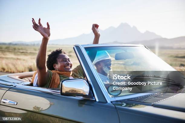 Smiling Woman Having Fun During A Scenic Road Trip With Her Husband In Summer Stock Photo - Download Image Now