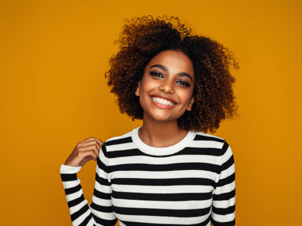 istock Beautiful afro woman 1387324673