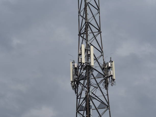 istock Wi-fi and GSM mobile service antennas hanged on the high pylon 1387326255