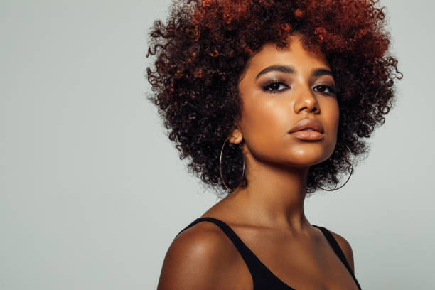 istock Beautiful afro woman with perfect make-up 1387326525