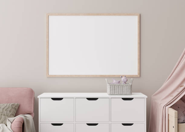istock Empty horizontal picture frame on cream wall in modern child room. Mock up interior in scandinavian style. Free, copy space for your picture, poster. Close up view. Cozy room for kids. 3D rendering. 1387326842