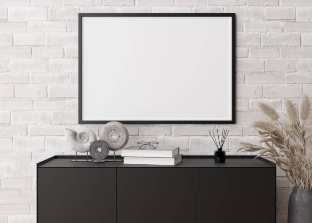 istock Empty horizontal picture frame on white brick wall in modern living room. Mock up interior in contemporary style. Free, copy space for picture, poster. Console, sculptures, pampas grass. 3D rendering. 1387326843
