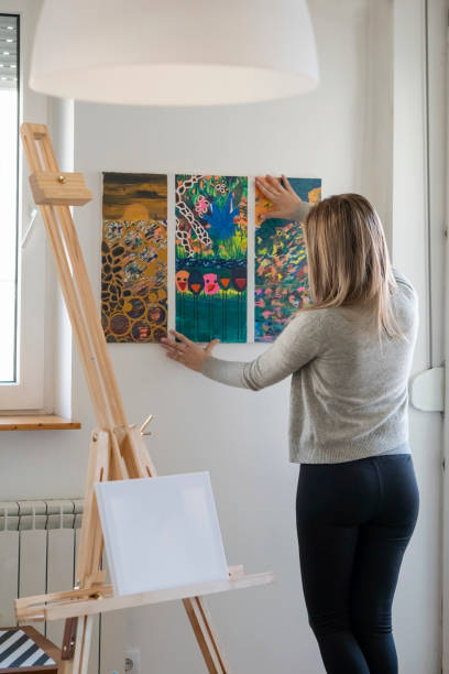istock Female Artist Working at home 1387330526