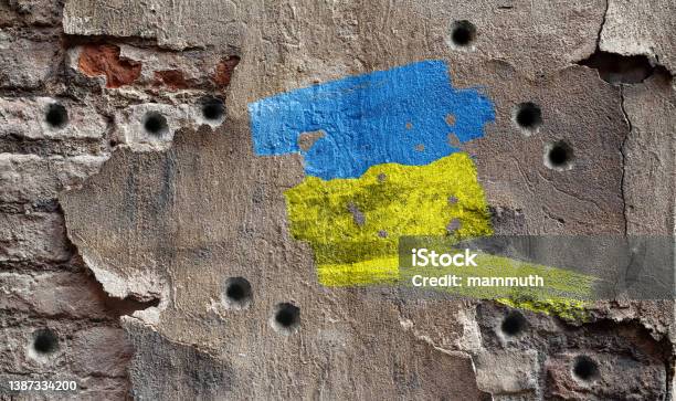 Ukrainian Colors On Damaged Wall Stock Photo - Download Image Now - Russian Invasion of Ukraine 2022 - 2023, Ukraine, War