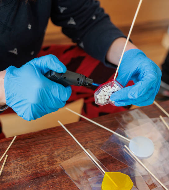 istock using kitchen burner for the production of lollipops in a home sweets manufacture 1387335820