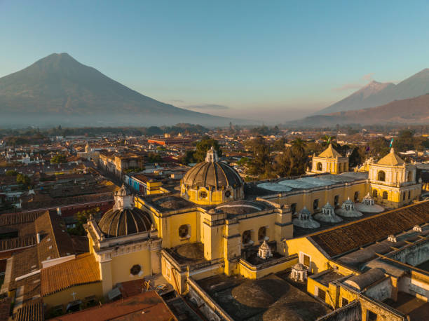 Aerial view of Antigua at sunrise Scenic aerial view of Antigua city at sunrise guatemala landscape stock pictures, royalty-free photos & images