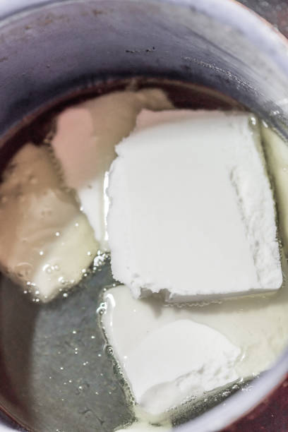 istock Lard fat in a pot is just melted and dissolves and becomes liquid in a kitchen while cooking, Germany 1387339768
