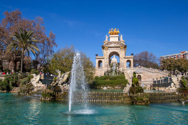 istock Fountain in Barcelona with a golden sculpture 1387342914