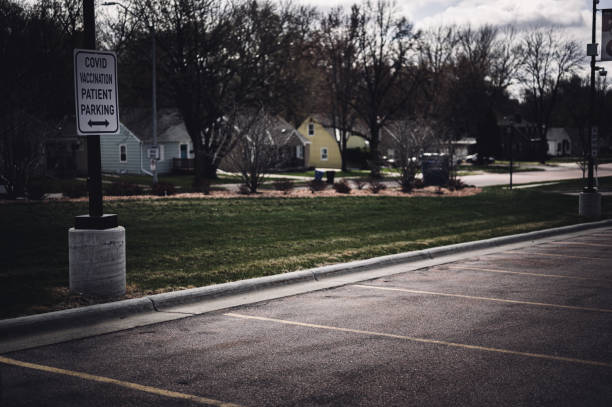 istock COVID vaccination site with sign and empty parking 1387343024