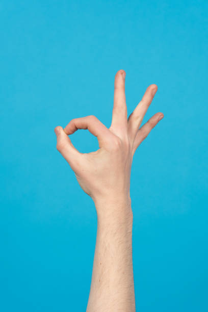 istock OK sign on blue background 1387344398