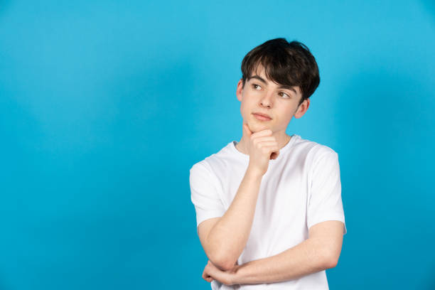 istock Teenager boy thinking on future 1387344436