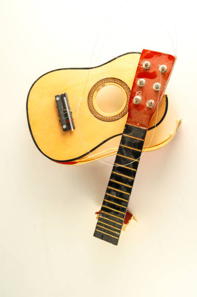 istock Close-up of borken classic guitar 1387346785