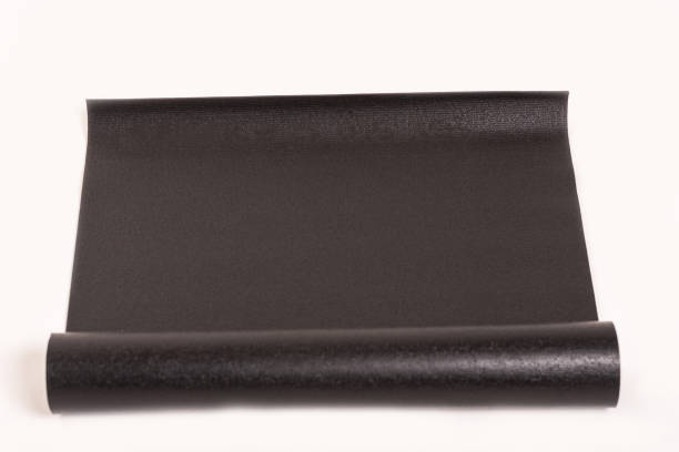 istock Black Yoga Mat isolated with White Background 1387347168