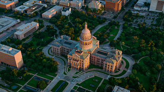 Aerial view of Texas State Capitol Building in downtown Austin at sunset, Texas, USA.