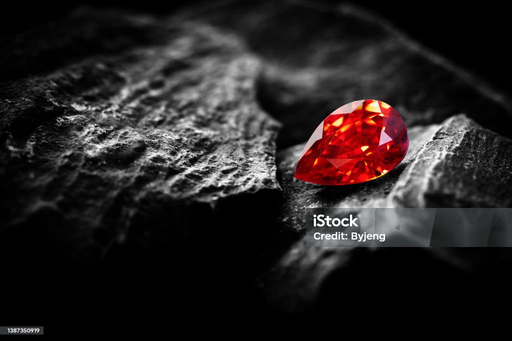 Red Ruby gemstone Round Cut on stone background, close up shot Gemstone, Precious Gem, Jewelry, Sapphire Diamond - Gemstone Stock Photo