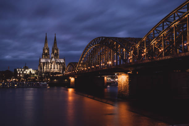 istock Cologne Cathedral and Hohenzollern Bridge at Night 1387358450