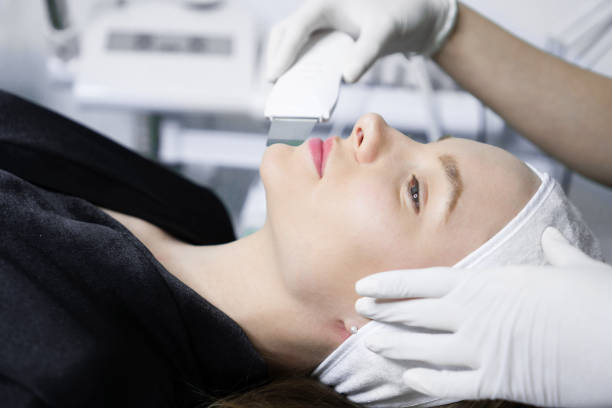istock Facial treatment at beauty salon 1387361039