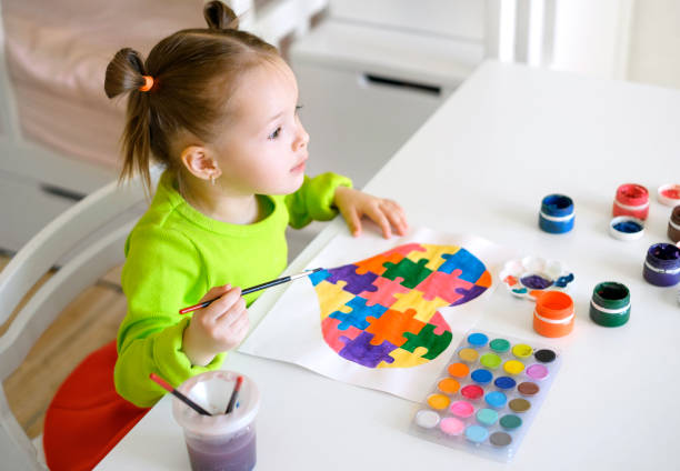 istock The child looks forward in surprise with bulging eyes. 1387362092