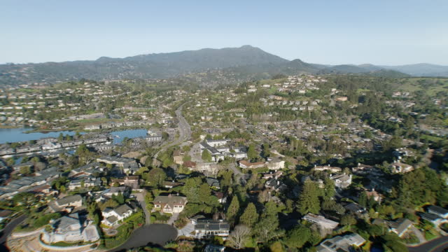 Corte Madera California USA 2020. Dramatic Ariel Drone view of moving Fly over neighborhoods nestled in the Marin Hills with Mount Tamalpais looming in the distance.
