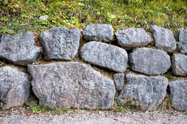 istock Texture stonewall made of big stones. 1387368992