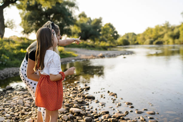 istock Walk along the river bank 1387384291