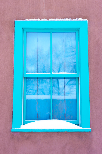 Santa Fe Style: Traditional Blue Window in Adobe Wall (Close-Up)