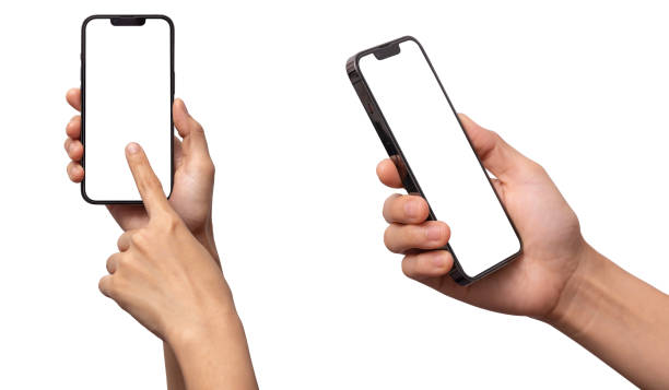 Hand holding the black smartphone with blank screen stock photo