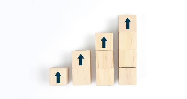 istock Wooden blocks chart steps with copy space. The business growth process 1387397038