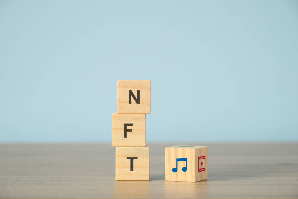 istock NFT, Music, Media, Video on Wooden Blocks - Concept Image 1387405996