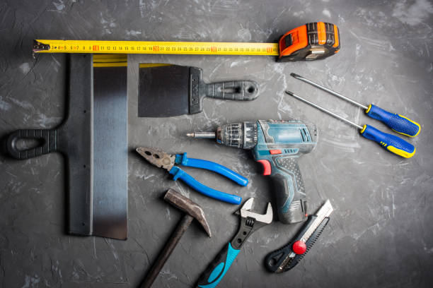 istock Construction tools set screwdriver, construction trowel, pliers, construction tape, hammer, office knife, adjustable wrench, template, 1387407044