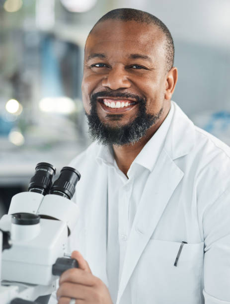 istock Shot of a mature man using a microscope in a lab 1387412459