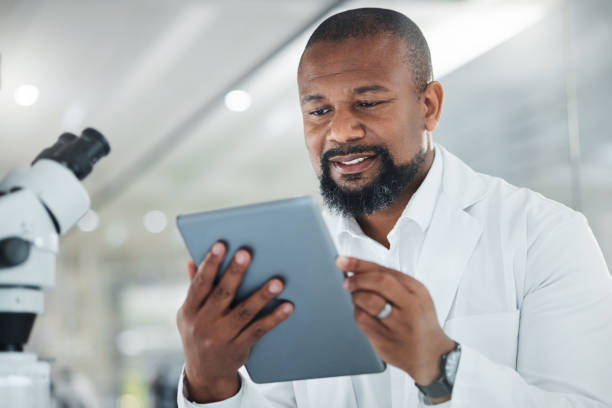 istock Shot of a male scientist using a digital tablet while working in a lab 1387412587