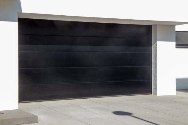 istock Modern new garage door (sectional door) 1387414945