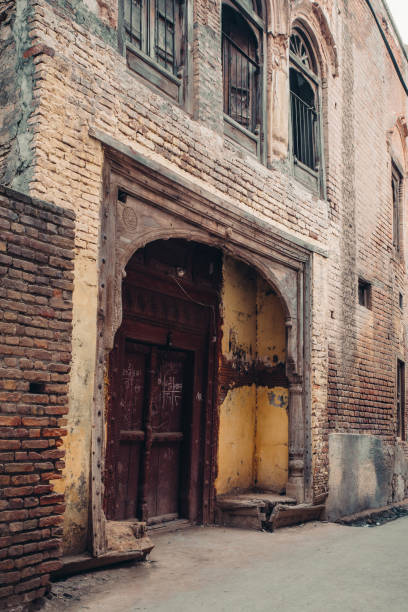 istock wooden door in the wall 1387415745