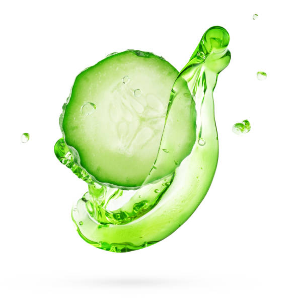 istock Green gel flowing with cucumber slice isolated on white background 1387416889