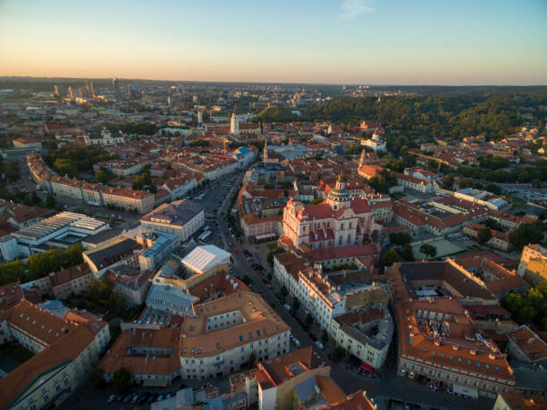 istock Vilnius Old Town with City Hall and Sunset Light in Background. 1387417006