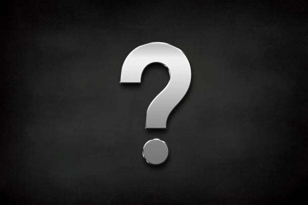 istock Metallic question mark symbol 3D design on black background 1387422706