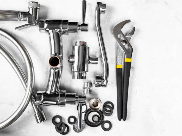 istock top of wrench, disassembled faucet with copyspace 1387423767