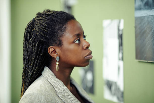 istock African American Art Critic In Gallery 1387425651