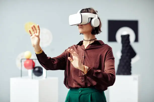 Photo of Woman Using VR Headset in Museum