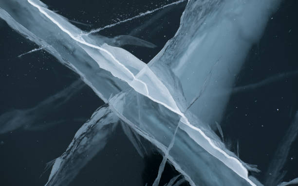istock Winter Baikal Lake ice with frozen cracks 1387425877