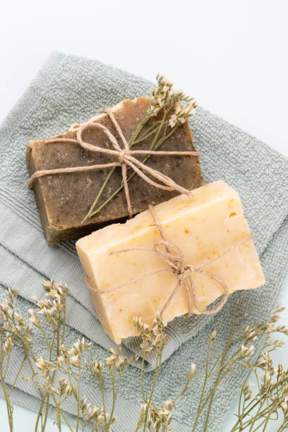 istock Handmade natural soap on pastel background. 1387429579